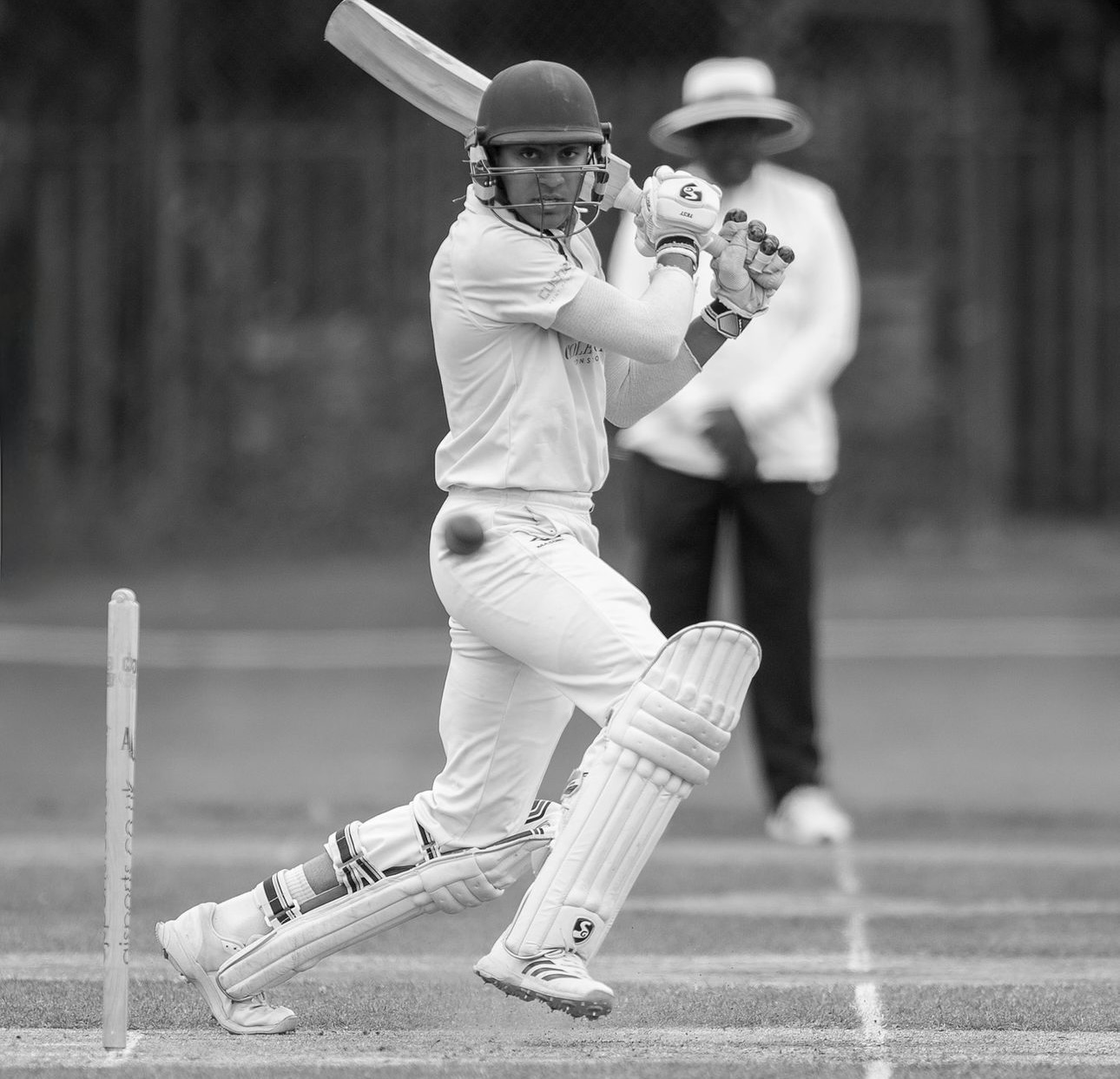 Dishen Patel playing a batting shot during a cricket match